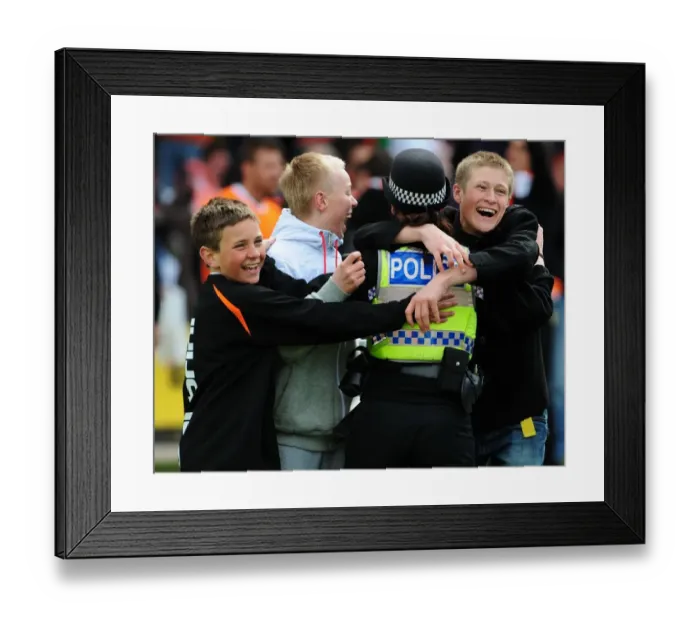 Framed Print : Jubilant Blackpool Fans Celebrate with Police after Championship Victory over Bristol City (02 / 05 / 2010)