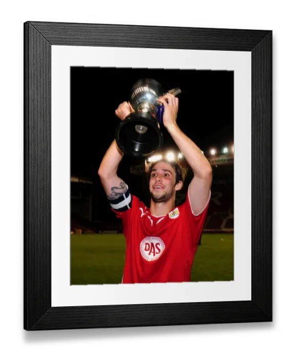 Framed Print : Frankie Artus Celebrates Glos Cup Victory with Trophy Lift at Bristol City Framed Print : Frankie Artus Celebrates Glos Cup Victory with Trophy Lift at Bristol City