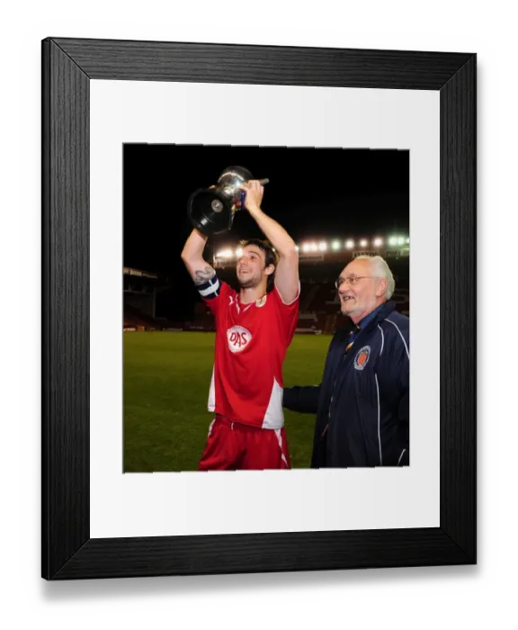 Framed Print : Bristol Citys Frankie Artus lifts the trophy