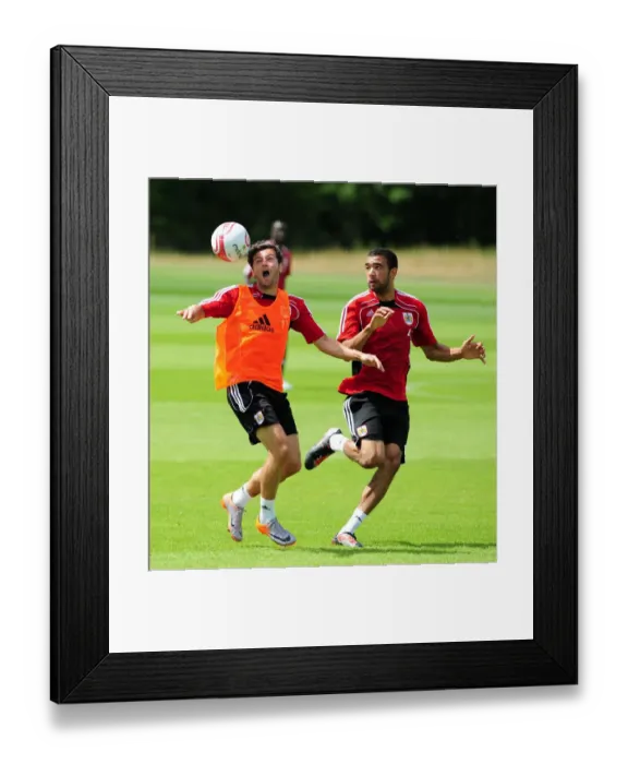 Framed Print : Bristol City: Intense Training Moment - Ivan Sproule vs. Liam Fontaine for the Ball