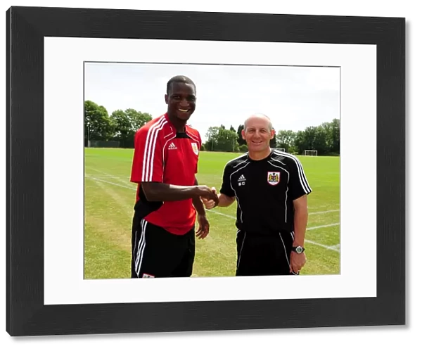 Bristol City New signing Kalifa Cisse with Bristol City Manager, Steve Coppell