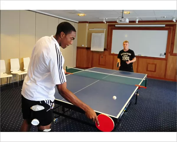 Bristol Citys Marlon Jackson plays table tennis with Bristol Citys Joe Lennox