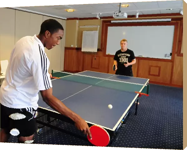 Bristol Citys Marlon Jackson plays table tennis with Bristol Citys Joe Lennox