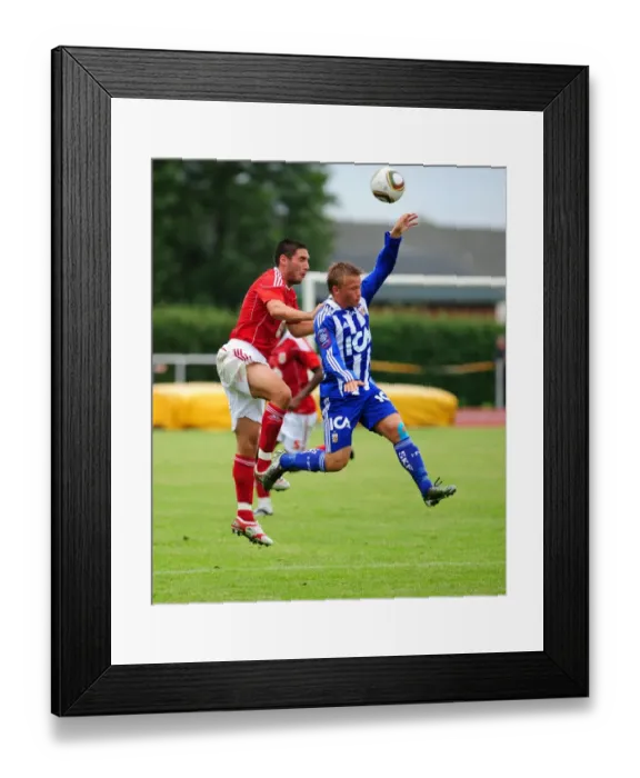 Framed Print : Bristol Citys Bradley Orr challenges for the ariel ball Framed Print : Bristol Citys Bradley Orr challenges for the ariel ball