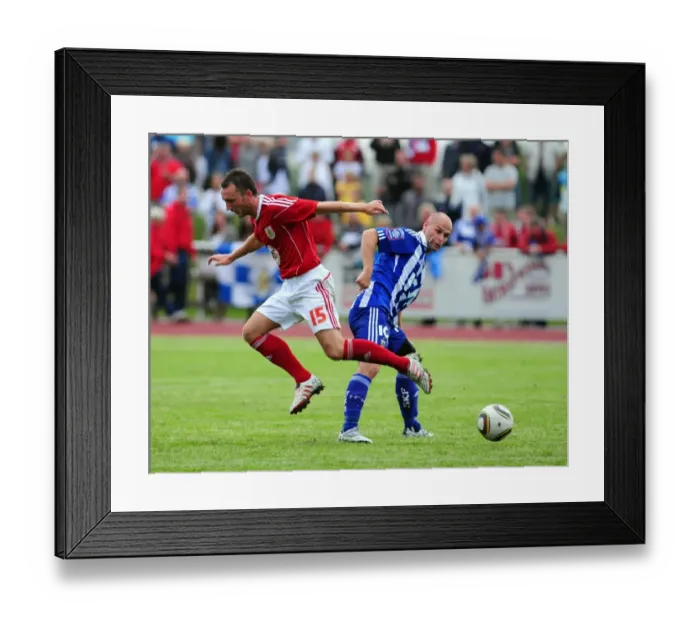 Framed Print : Bristol Citys Gavin Williams battles for the ball