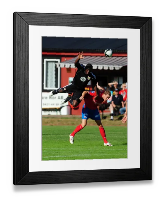 Framed Print : John Akinde Battles for Aerial Supremacy: Helsingborgs IF vs. Bristol City Framed Print : John Akinde Battles for Aerial Supremacy: Helsingborgs IF vs. Bristol City
