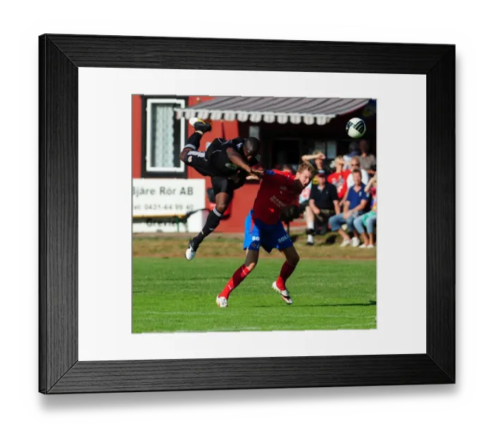 Framed Print : Bristol Citys John Akinde challenges for the ariel ball Framed Print : Bristol Citys John Akinde challenges for the ariel ball