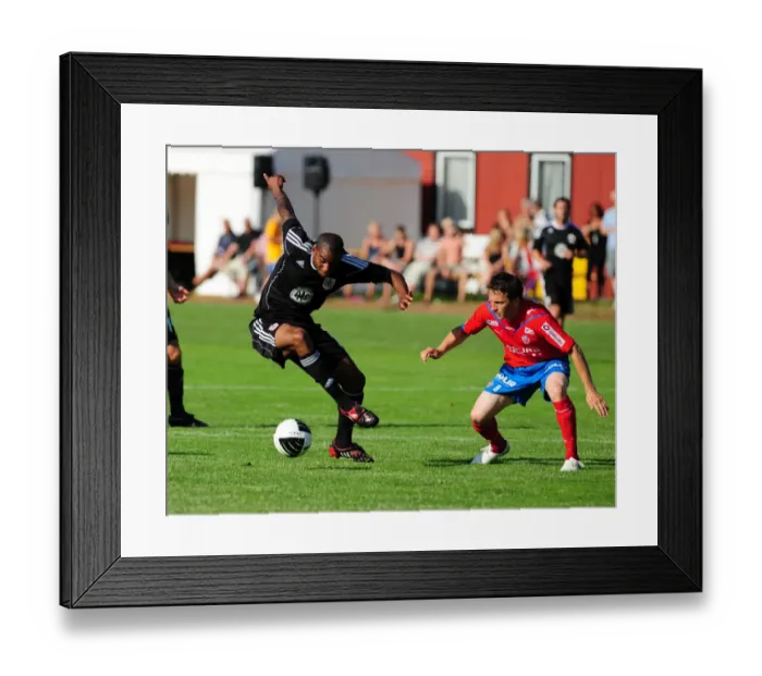 Framed Print : Marvin Elliott's Determined Battle for the Ball: Helsingborgs IF vs. Bristol City Framed Print : Marvin Elliott's Determined Battle for the Ball: Helsingborgs IF vs. Bristol City