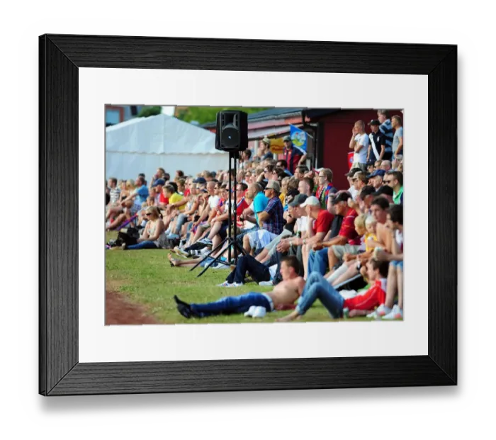 Framed Print : Fans from both teams sit in the sun Framed Print : Fans from both teams sit in the sun