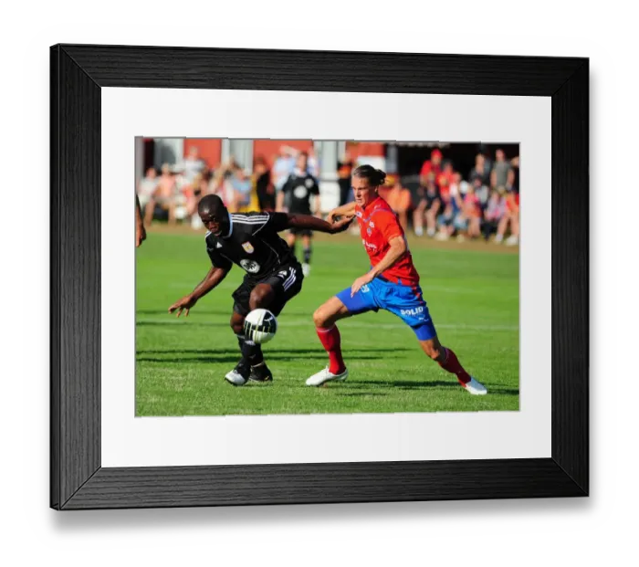 Framed Print : John Akinde's Determined Fight for Possession: Helsingborgs IF vs. Bristol City Framed Print : John Akinde's Determined Fight for Possession: Helsingborgs IF vs. Bristol City