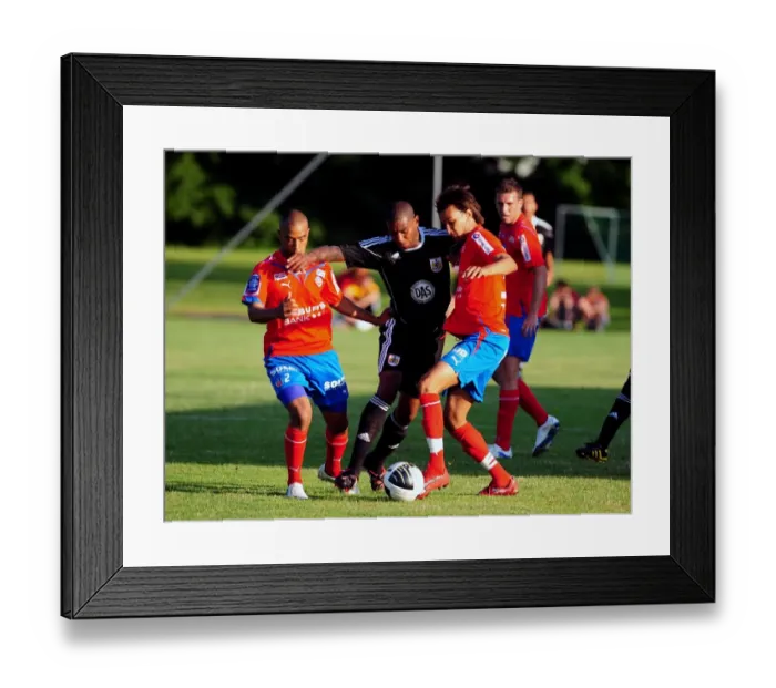 Framed Print : Marvin Elliott's Tenacious Battle for the Ball: Helsingborgs IF vs. Bristol City
