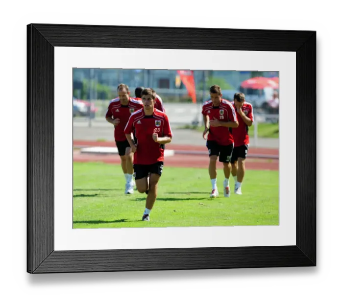 Framed Print : Bristol Citys Joe Edwards leads the warm up
