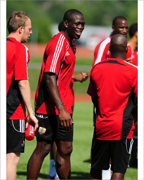 Bristol Citys John Akinde shares a joke with team mates
