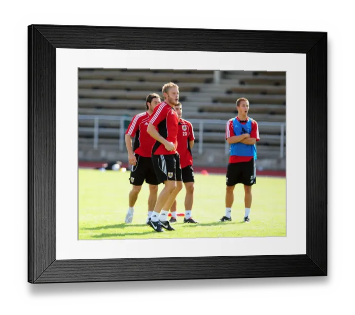 Framed Print : Bristol City Goalkeeper, Dean Gerken hits the bar to win the competition in training Framed Print : Bristol City Goalkeeper, Dean Gerken hits the bar to win the competition in training