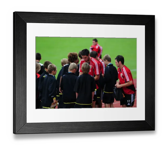 Framed Print : Bristol City players sign autographs
