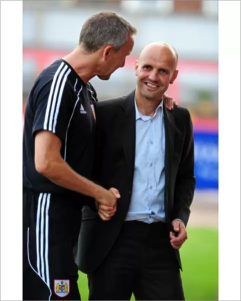 Bristol City Assistant Manager, Keith Millenwith Exeter city Manager Paul Tisdale