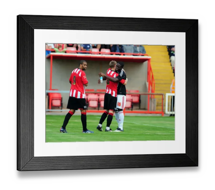 Framed Print : Bristol Citys John Akinde with former team mate David Noble