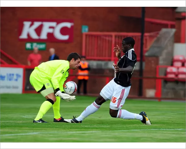 Bristol Citys John Akinde goes for goal