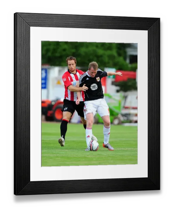 Framed Print : Bristol Citys David Clarkson battles for the ball with Ryan Harley