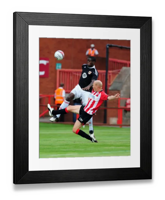 Framed Print : Bristol Citys John Akinde battles for the ball with Rob Edwards Framed Print : Bristol Citys John Akinde battles for the ball with Rob Edwards
