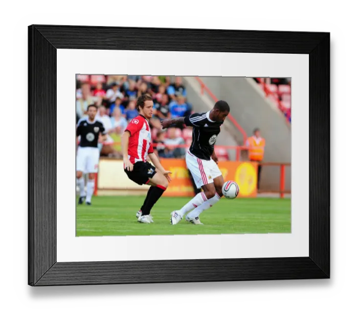 Framed Print : Intense Rivalry: Marvin Elliott vs. Ryan Harley in a Hard-Fought Battle