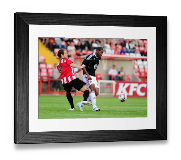 Framed Print : Intense Rivalry: Marvin Elliott vs. Ryan Harley - A Hard-Fought Battle Between Bristol City and Exeter City