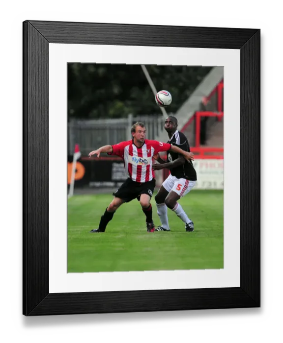 Framed Print : Marcus Stewart battles for the ball with Bristol Citys Kalifa Cisse