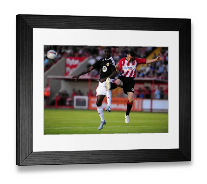 Framed Print : Adomah's Determined Struggle: Battling for the Ball in the Exeter City vs. Bristol City Match Framed Print : Adomah's Determined Struggle: Battling for the Ball in the Exeter City vs. Bristol City Match