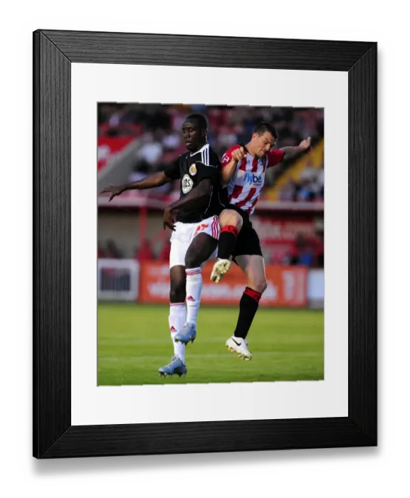 Framed Print : Bristol Citys Albert Adomah battles for the ball