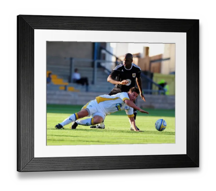 Framed Print : Bristol Citys Kalifa Cisse battles for the ball with Torquays Elliot Benyon Framed Print : Bristol Citys Kalifa Cisse battles for the ball with Torquays Elliot Benyon