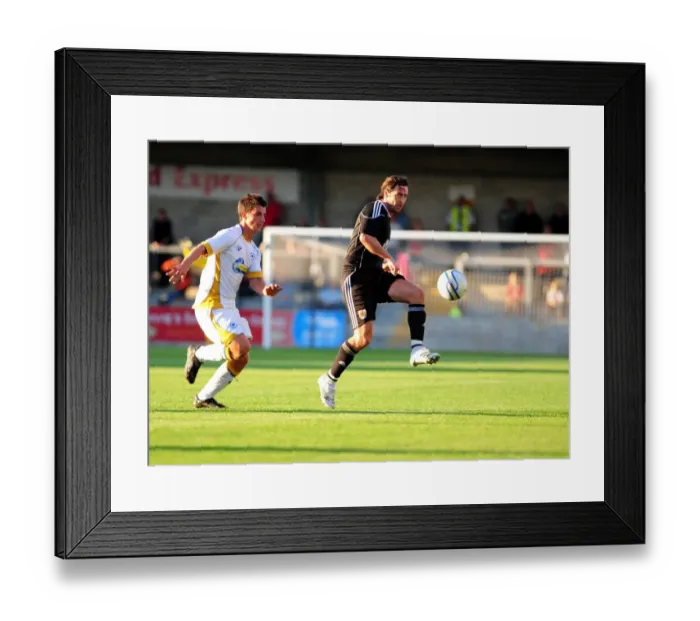 Framed Print : Bristol Citys Jamie McAllister clears the ball