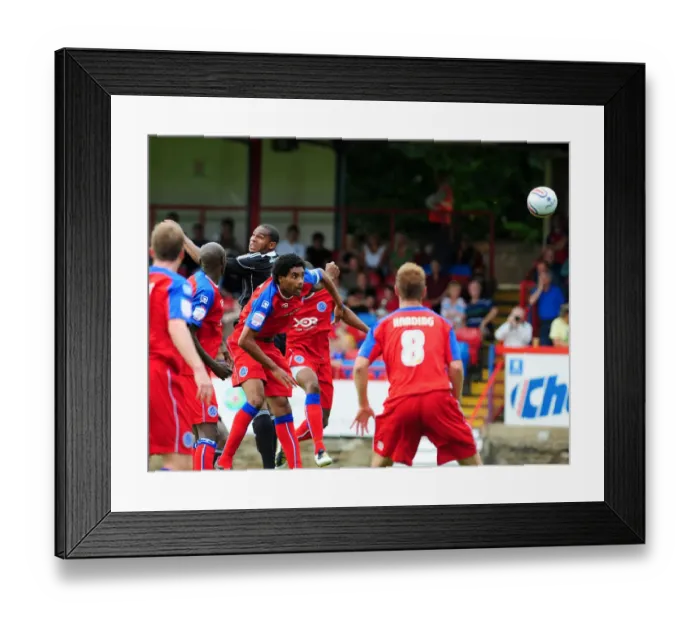 Framed Print : Bristol Citys Marvin Elliott heads for goal
