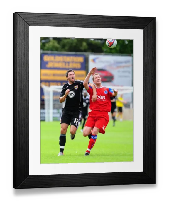 Framed Print : Bristol City's Ivan Sproule vs. Aldershot's Jamie Vincent: A Battle for Ball Possession Framed Print : Bristol City's Ivan Sproule vs. Aldershot's Jamie Vincent: A Battle for Ball Possession