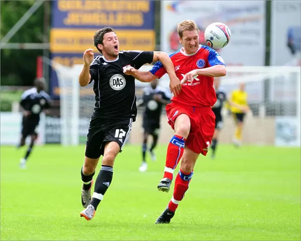 Bristol Citys Ivan Sproule battles for the ball with Aldershots Jamie Vincent
