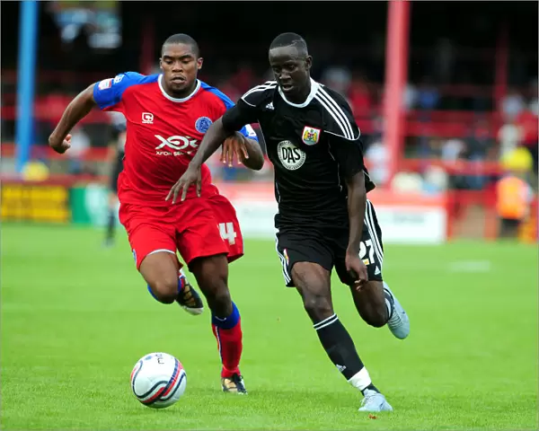 Bristol Citys Albert Adomah battles for the ball with Aldershots Manny Panther