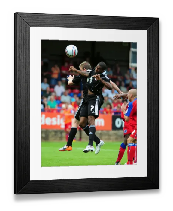 Framed Print : Bristol Citys Marvin Elliott and Bristol Citys David Clarkson challenge for the ariel ball Framed Print : Bristol Citys Marvin Elliott and Bristol Citys David Clarkson challenge for the ariel ball