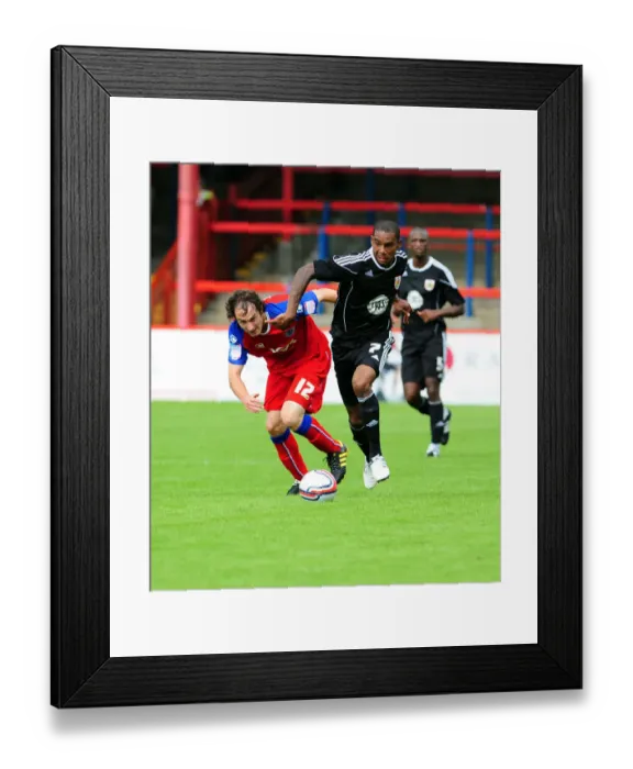 Framed Print : Battling for Supremacy: Marvin Elliott vs. Danny Hylton in Intense Football Clash