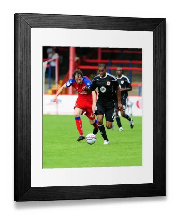Framed Print : Bristol Citys Marvin Elliott battles for the ball with Aldershots Danny Hylton Framed Print : Bristol Citys Marvin Elliott battles for the ball with Aldershots Danny Hylton