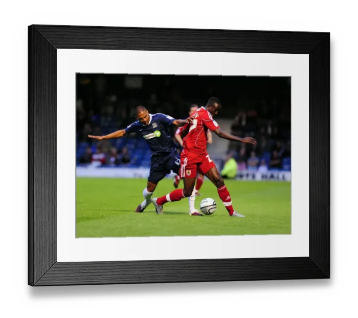 Framed Print : Adomah vs Soares: Intense Battle in the Carling Cup Clash between Southend United and Bristol City Framed Print : Adomah vs Soares: Intense Battle in the Carling Cup Clash between Southend United and Bristol City