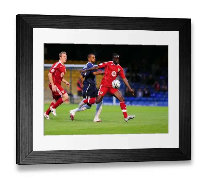 Framed Print : Adomah vs Soares: Battle for the Ball in the Carling Cup Clash between Southend United and Bristol City (10-08-2010)