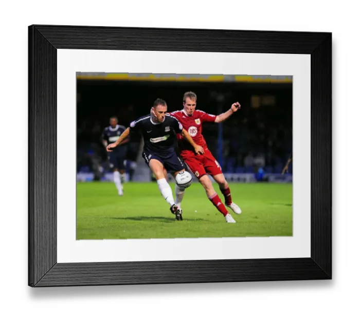 Framed Print : Clash at Roots Hall: David Clarkson vs Graham Coughlan in the Carling Cup Battle between Southend United and Bristol City (August 10, 2010)