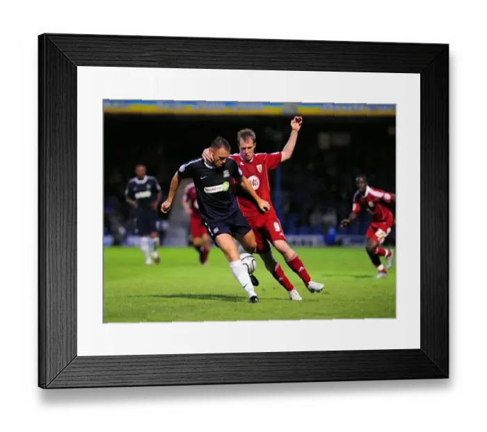 Framed Print : Clash at Roots Hall: David Clarkson vs. Graham Coughlan in the Carling Cup Battle between Southend United and Bristol City (August 10, 2010)