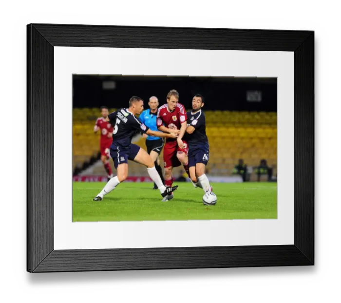 Framed Print : Bristol City's David Clarkson Fights for Possession Amidst Southend United's Graham Coughlan and Sofiene Zaaboub - Carling Cup Clash, 2010 Framed Print : Bristol City's David Clarkson Fights for Possession Amidst Southend United's Graham Coughlan and Sofiene Zaaboub - Carling Cup Clash, 2010