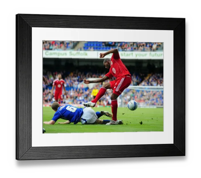 Framed Print : Marvin Elliott vs Grant Leadbitter: Intense Tackle in Championship Clash between Ipswich and Bristol City (August 2010) Framed Print : Marvin Elliott vs Grant Leadbitter: Intense Tackle in Championship Clash between Ipswich and Bristol City (August 2010)