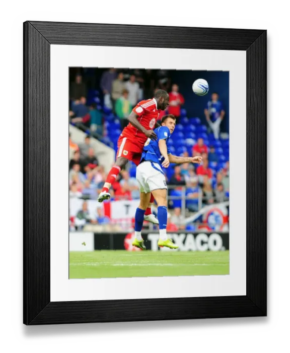 Framed Print : Damion Stewart vs. Tamas Priskin: Aerial Battle in the Championship Clash between Ipswich and Bristol City - August 28, 2010 Framed Print : Damion Stewart vs. Tamas Priskin: Aerial Battle in the Championship Clash between Ipswich and Bristol City - August 28, 2010