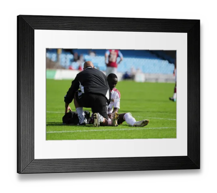 Framed Print : Bristol City's Albert Adomah Receives Treatment During Scunthorpe United vs. Bristol City Championship Match, September 11, 2010