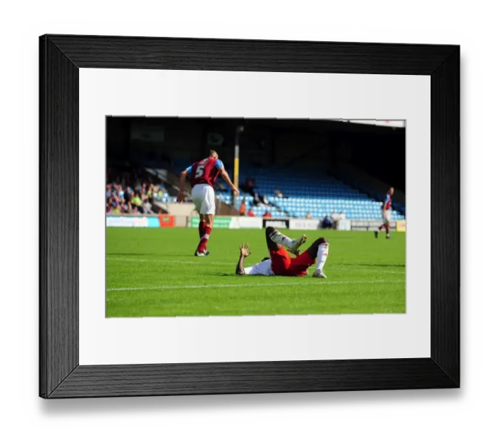 Framed Print : Scunthorpe United vs. Bristol City: Albert Adomah's Injury Marrs Championship Clash (September 11, 2010) Framed Print : Scunthorpe United vs. Bristol City: Albert Adomah's Injury Marrs Championship Clash (September 11, 2010)