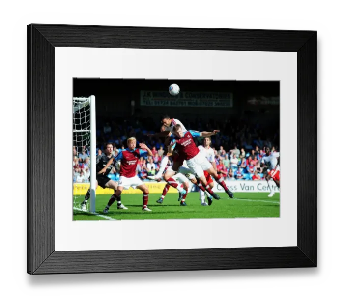 Framed Print : Bristol City's Liam Fontaine Battles for Aerial Ball Against Scunthorpe's Michael O'Connor - Championship Clash, September 11, 2010 Framed Print : Bristol City's Liam Fontaine Battles for Aerial Ball Against Scunthorpe's Michael O'Connor - Championship Clash, September 11, 2010