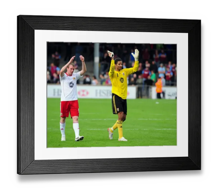 Framed Print : Championship Glory: David James and David Clarkson's Emotional Reunion after Bristol City's Victory over Scunthorpe United (September 11, 2010)