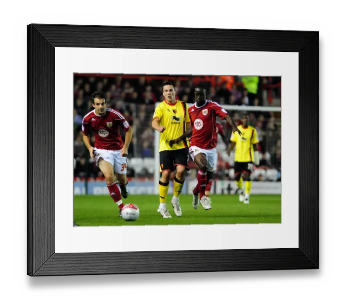 Framed Print : Adomah vs. Cowie: Intense Battle for the Ball in Bristol City vs. Watford Championship Match Framed Print : Adomah vs. Cowie: Intense Battle for the Ball in Bristol City vs. Watford Championship Match